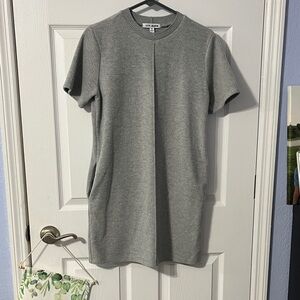Steve Madden Light Gray Short Sleeve Sweater Dress with pockets.